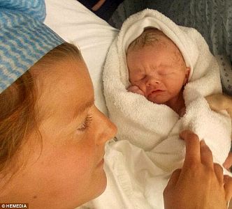 Mother told to abort her baby at 20 weeks over fears he would 'be paralysed and have no quality of life' gives birth a healthy son