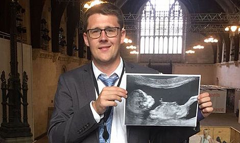 MP shows scan of unborn daughter in Parliament